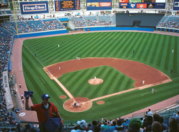 PHOTO: US Cellular Field, possibly about to kill and eat Comiskey Park 